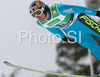 Vincent Descombes Sevoie of France soars through the air during first round of Team competition of FIS Ski jumping World Cup finals in Planica, Slovenia. Team competition of FIS Ski jumping World cup finals was held on Saturday, 21st of March 2009 in Planica, Slovenia.
