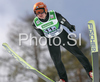 Harri Olli of Finland soars through the air during first round of Team competition of FIS Ski jumping World Cup finals in Planica, Slovenia. Team competition of FIS Ski jumping World cup finals was held on Saturday, 21st of March 2009 in Planica, Slovenia.
