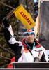Head coach of Finland Janne Vaeaetaeinen lifts the flag for the start during qualification round of the FIS Ski Jumping World Cup event of the 58th Four Hills ski jumping tournament, on January 3, 2010 in Bergisel, Innsbruck, Austria.
