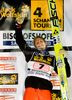Winner Thomas Morgenstern of Austria celebrates at the medal ceremony at the last of the FIS Ski Jumping World Cup event of the 58th Four Hills ski jumping tournament, on January 6, 2010 in Bischofshofen, Austria. 
