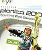 Winner Simon Ammann of Switzerland celebrates his medal won in FIS Ski flying World championships in Planica, Slovenia. Second day of FIS Ski flying World Championships was held on Saturday, 20th of March 2010, in Planica, Slovenia.
