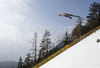 Michael Uhrmann of Germany soars through the air during his ski jump of second day of FIS Ski flying World championships in Planica, Slovenia. Second day of FIS Ski flying World Championships was held on Saturday, 20th of March 2010, in Planica, Slovenia.
