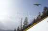 Adam Malysz of Poland soars through the air during his ski jump of second day of FIS Ski flying World championships in Planica, Slovenia. Second day of FIS Ski flying World Championships was held on Saturday, 20th of March 2010, in Planica, Slovenia.
