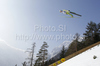 Simon Ammann of Switzerland soars through the air during his ski jump of second day of FIS Ski flying World championships in Planica, Slovenia. Second day of FIS Ski flying World Championships was held on Saturday, 20th of March 2010, in Planica, Slovenia.
