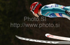 Matti Hautamaeki of Finland soars through the air during his ski jump of team event of FIS Ski flying World championships in Planica, Slovenia. Second day of FIS Ski flying World Championships was held on Sunday, 21st of March 2010, in Planica, Slovenia.
