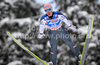 Martin Koch (AUT) <br>  <br>  during FIS Ski jumping World cup race in Engelberg, Switzerland. FIS Ski jumping World cup in Engelberg, Switzerland was held on 18th of December 2010.
