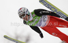 Simon Ammann of Switzerland soars through the air in first round of day 1 of FIS ski jumping World Cup 2010-2011 finals in Planica, Slovenia. Individual competition on first day of FIS ski jumping World cup finals was held on Friday, 18th of March 2011, in Planica, Slovenia.
