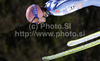 Michael Neumayer of Germany soars through the air during first round of day 3 of FIS ski jumping World Cup 2010-2011 finals in Planica, Slovenia. Last individual competition of season on day 3 of FIS ski jumping World cup finals was held on Sunday, 20th of March 2011, in Planica, Slovenia.

