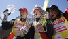 Winner Thomas Morgenstern of Austria (M) with his coach Alexander Pointner (L) celebrates World cup overall medal won in FIS ski jumping World Cup 2010-2011. Final race of  FIS ski jumping World cup 2010-2011 was held on Sunday, 20th of March 2011, in Planica, Slovenia.
