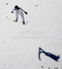 Winner Kamil Stoch of Poland soars through the air during first round of day 3 of FIS ski jumping World Cup 2010-2011 finals in Planica, Slovenia. Last individual competition of season on day 3 of FIS ski jumping World cup finals was held on Sunday, 20th of March 2011, in Planica, Slovenia.
