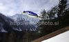 Forejumper soars through the air during trial round of day 3 of FIS ski jumping World Cup 2010-2011 finals in Planica, Slovenia. Last individual competition of season on day 3 of FIS ski jumping World cup finals was held on Sunday, 20th of March 2011, in Planica, Slovenia.
