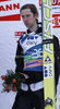 Third placed Martin Koch of Austria celebrates his medal won in the Flying hill Individual competition of FIS World cup ski jumping  finals in Planica, Slovenia. Flying hill Individual competition FIS World ski jumping finals was held on Friday, 16th of March 2012, in Planica, Slovenia.
