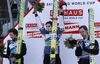 Winner Robert Kranjec of Slovenia (middle), second placed Simon Ammann of Switzerland (left) and third placed Martin Koch of Austria (right) celebrate their medals won in the Flying hill Individual competition of FIS World cup ski jumping  finals in Planica, Slovenia. Flying hill Individual competition FIS World ski jumping finals was held on Friday, 16th of March 2012, in Planica, Slovenia.

