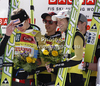 Winner team of Austria celebrates their medals won in the Flying hill team competition of FIS World cup ski jumping  finals in Planica, Slovenia. Flying hill Team competition FIS World ski jumping finals was held on Saturday, 17th of March 2012, in Planica, Slovenia.
