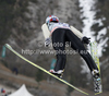 Simon Ammann of Switzerland soars through the air during the trial round of the Flying hill Individual competition of FIS World cup ski jumping  finals in Planica, Slovenia. Flying hill Individual  competition FIS World ski jumping finals was held on Sunday, 18th of March 2012, in Planica, Slovenia.
