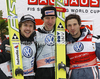 Winner Martin Koch of Austria (middle), second placed Simon Ammann of Switzerland (left) and third placed Robert Kranjec of Slovenia (right) celebrate their medals won in the Flying hill Individual competition of FIS World cup ski jumping  finals in Planica, Slovenia. Flying hill Individual  competition FIS World ski jumping finals was held on Sunday, 18th of March 2012, in Planica, Slovenia.
