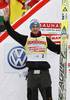 Second placed Gregor Schlierenzauer of Austria celebrates his medal won in the overall classification of the season 2011 / 2012  of FIS World cup ski jumping in Planica, Slovenia. Flying hill competition FIS World ski jumping finals was held on Sunday, 18th of March 2012, in Planica, Slovenia.

