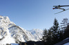 Karl Geiger of Germany soars through the air during first round of day 1 in FIS Ski jumping World cup finals in Planica, Slovenia. FIS ski jumping World cup finals were held on HS215 ski flying hill in Planica, Slovenia, on Friday, 22nd of March 2013.
