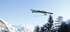 Robert Kranjec of Slovenia soars through the air during first round of day 1 in FIS Ski jumping World cup finals in Planica, Slovenia. FIS ski jumping World cup finals were held on HS215 ski flying hill in Planica, Slovenia, on Friday, 22nd of March 2013.
