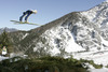 Kaarel Nurmsalu of Estonia soars through the air during first round of day 1 in FIS Ski jumping World cup finals in Planica, Slovenia. FIS ski jumping World cup finals were held on HS215 ski flying hill in Planica, Slovenia, on Friday, 22nd of March 2013.
