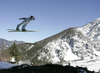 Kaarel Nurmsalu of Estonia soars through the air during first round of day 1 in FIS Ski jumping World cup finals in Planica, Slovenia. FIS ski jumping World cup finals were held on HS215 ski flying hill in Planica, Slovenia, on Friday, 22nd of March 2013.
