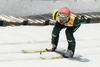 Martin Koch of Austria on in run during team competition on day 2 in FIS Ski jumping World cup finals in Planica, Slovenia. Team competition of FIS ski jumping World cup finals was held on HS215 ski flying hill in Planica, Slovenia, on Saturday, 23rd of March 2013.
