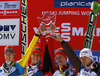 Winning team of Slovenia with Andraz Pograjc (L), Jurij Tepes (2nd from L), Primoz Prevc (2nd from R) and Robert Kranjec (R) celebrate their victory in team competition on day 2 in FIS Ski jumping World cup finals in Planica, Slovenia. Team competition of FIS ski jumping World cup finals was held on HS215 ski flying hill in Planica, Slovenia, on Saturday, 23rd of March 2013.
