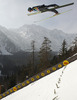 Maciej Kot of Poland soars through the air during team competition on day 2 in FIS Ski jumping World cup finals in Planica, Slovenia. Team competition of FIS ski jumping World cup finals was held on HS215 ski flying hill in Planica, Slovenia, on Saturday, 23rd of March 2013.

