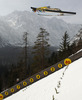 Peter Prevc of Slovenia soars through the air during team competition on day 2 in FIS Ski jumping World cup finals in Planica, Slovenia. Team competition of FIS ski jumping World cup finals was held on HS215 ski flying hill in Planica, Slovenia, on Saturday, 23rd of March 2013.

