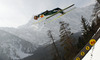 Martin Koch of Austria soars through the air during team competition on day 2 in FIS Ski jumping World cup finals in Planica, Slovenia. Team competition of FIS ski jumping World cup finals was held on HS215 ski flying hill in Planica, Slovenia, on Saturday, 23rd of March 2013.
