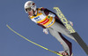 Stefan Kraft of Austria soars through the air during team competition on day 2 in FIS Ski jumping World cup finals in Planica, Slovenia. Team competition of FIS ski jumping World cup finals was held on HS215 ski flying hill in Planica, Slovenia, on Saturday, 23rd of March 2013.
