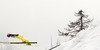 Michael Neumayer of Germany soars through the air during individual competition on day 3 in FIS Ski jumping World cup finals in Planica, Slovenia. Last individual competition of FIS ski jumping World cup finals was held on HS215 ski flying hill in Planica, Slovenia, on Sunday, 24th of March 2013.
