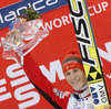Winner Jurij Tepes of Slovenia celebrates his medal won in individual competition on day 3 in FIS Ski jumping World cup finals in Planica, Slovenia. Last individual competition of FIS ski jumping World cup finals was held on HS215 ski flying hill in Planica, Slovenia, on Sunday, 24th of March 2013.
