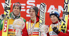 Overall FIS Ski jumping world cup winner Gregor Schlierenzauer of Austria (M), second placed Anders Bardal of Norway (L) and third placed Kamil Stoch of Poland (R) celebrate their medals and crystal globe won in FIS Ski Jumping World cup 2012-2013. Crystal globe for FIS Ski jumping World cup 2012-2013 was presented after last individual competition of FIS ski jumping World cup finals which was held on HS215 ski flying hill in Planica, Slovenia, on Sunday, 24th of March 2013.
