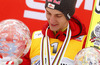 Overall FIS Ski jumping world cup winner Gregor Schlierenzauer of Austria celebrates his victory and his crystal globe won in FIS Ski Jumping World cup 2012-2013. Crystal globe for FIS Ski jumping World cup 2012-2013 was presented after last individual competition of FIS ski jumping World cup finals which was held on HS215 ski flying hill in Planica, Slovenia, on Sunday, 24th of March 2013.
