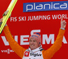 Winner Severin Freund of Germany celebrates his medals victory in Viessmann FIS ski jumping World cup in Planica, Slovenia. Race of Viessmann FIS ski jumping World cup 2013-2014 was held on Friday, 21st of March 2014 on HS139 ski jumping hill in Planica, Slovenia.

