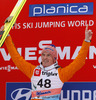 Winner Severin Freund of Germany celebrates his medals victory in Viessmann FIS ski jumping World cup in Planica, Slovenia. Race of Viessmann FIS ski jumping World cup 2013-2014 was held on Friday, 21st of March 2014 on HS139 ski jumping hill in Planica, Slovenia.
