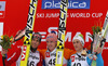 Winner Severin Freund of Germany (M), second placed Anders Bardal of Norway (L) and third placed Peter Prevc of Slovenia (R) celebrate their medals won in Viessmann FIS ski jumping World cup in Planica, Slovenia. Race of Viessmann FIS ski jumping World cup 2013-2014 was held on Friday, 21st of March 2014 on HS139 ski jumping hill in Planica, Slovenia.
