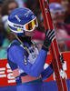 Julia Kykkaenen of Finland reacts in outrun of HS139 hill during women race of Viessmann FIS ski jumping World cup in Planica, Slovenia. Women race of Viessmann FIS ski jumping World cup 2013-2014 was held on Saturday, 22nd of March 2014 on HS139 ski jumping hill in Planica, Slovenia.
