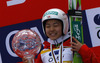 Overall World cup winner Sara Takanashi of Japan celebrates her victory with crystal trophy after women race of Viessmann FIS ski jumping World cup in Planica, Slovenia. Women race of Viessmann FIS ski jumping World cup 2013-2014 was held on Saturday, 22nd of March 2014 on HS139 ski jumping hill in Planica, Slovenia.
