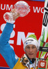 Peter Prevc of Slovenia celebrates winning overall FIS Ski flying World cup with his crystal globe after last race of Viessmann FIS ski jumping World cup season 2013-2014 in Planica, Slovenia. Last race of Viessmann FIS ski jumping World cup season 2013-2014 was held on Sunday, 23rd of March 2014 on HS139 ski jumping hill in Planica, Slovenia.
