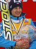 Kamil Stoch of Poland celebrates winning overall FIS Ski jumping World cup with his crystal globe after last race of Viessmann FIS ski jumping World cup season 2013-2014 in Planica, Slovenia. Last race of Viessmann FIS ski jumping World cup season 2013-2014 was held on Sunday, 23rd of March 2014 on HS139 ski jumping hill in Planica, Slovenia.
