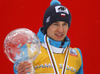 Kamil Stoch of Poland celebrates winning overall FIS Ski jumping World cup with his crystal globe after last race of Viessmann FIS ski jumping World cup season 2013-2014 in Planica, Slovenia. Last race of Viessmann FIS ski jumping World cup season 2013-2014 was held on Sunday, 23rd of March 2014 on HS139 ski jumping hill in Planica, Slovenia.
