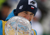 Kamil Stoch of Poland celebrates winning overall FIS Ski jumping World cup with his crystal globe after last race of Viessmann FIS ski jumping World cup season 2013-2014 in Planica, Slovenia. Last race of Viessmann FIS ski jumping World cup season 2013-2014 was held on Sunday, 23rd of March 2014 on HS139 ski jumping hill in Planica, Slovenia.
