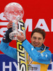 Kamil Stoch of Poland celebrates winning overall FIS Ski jumping World cup with his crystal globe after last race of Viessmann FIS ski jumping World cup season 2013-2014 in Planica, Slovenia. Last race of Viessmann FIS ski jumping World cup season 2013-2014 was held on Sunday, 23rd of March 2014 on HS139 ski jumping hill in Planica, Slovenia.
