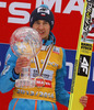 Kamil Stoch of Poland celebrates winning overall FIS Ski jumping World cup with his crystal globe after last race of Viessmann FIS ski jumping World cup season 2013-2014 in Planica, Slovenia. Last race of Viessmann FIS ski jumping World cup season 2013-2014 was held on Sunday, 23rd of March 2014 on HS139 ski jumping hill in Planica, Slovenia.
