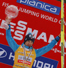 Kamil Stoch of Poland celebrates winning overall FIS Ski jumping World cup with his crystal globe after last race of Viessmann FIS ski jumping World cup season 2013-2014 in Planica, Slovenia. Last race of Viessmann FIS ski jumping World cup season 2013-2014 was held on Sunday, 23rd of March 2014 on HS139 ski jumping hill in Planica, Slovenia.
