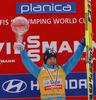 Kamil Stoch of Poland celebrates winning overall FIS Ski jumping World cup with his crystal globe after last race of Viessmann FIS ski jumping World cup season 2013-2014 in Planica, Slovenia. Last race of Viessmann FIS ski jumping World cup season 2013-2014 was held on Sunday, 23rd of March 2014 on HS139 ski jumping hill in Planica, Slovenia.
