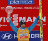 Kamil Stoch of Poland celebrates winning overall FIS Ski jumping World cup with his crystal globe after last race of Viessmann FIS ski jumping World cup season 2013-2014 in Planica, Slovenia. Last race of Viessmann FIS ski jumping World cup season 2013-2014 was held on Sunday, 23rd of March 2014 on HS139 ski jumping hill in Planica, Slovenia.
