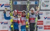 Second Placed Michael Hayboeck of Austria, Winner Stefan Kraft of Austria, third Place Peter Prevc of Slovenia celebrate on Podium of 63 rd Four Hills Tournament of FIS Ski Jumping World Cup at the Schattenbergschanze, Oberstdorf, Germany on 2014/12/29.
